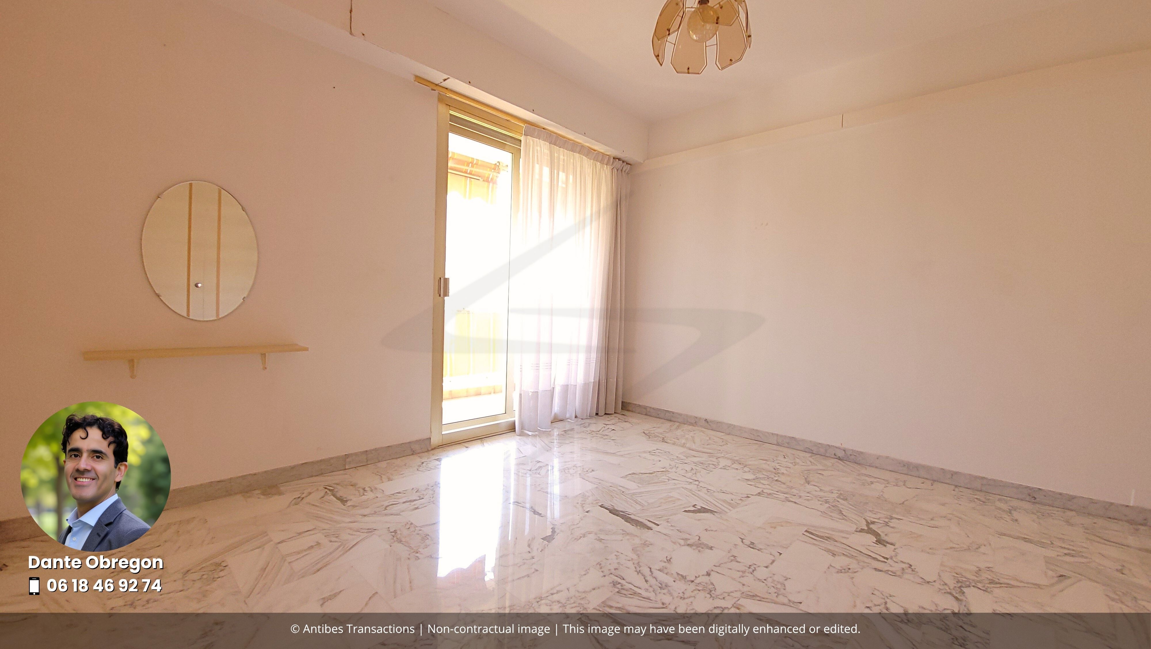 View of one of the three bedrooms