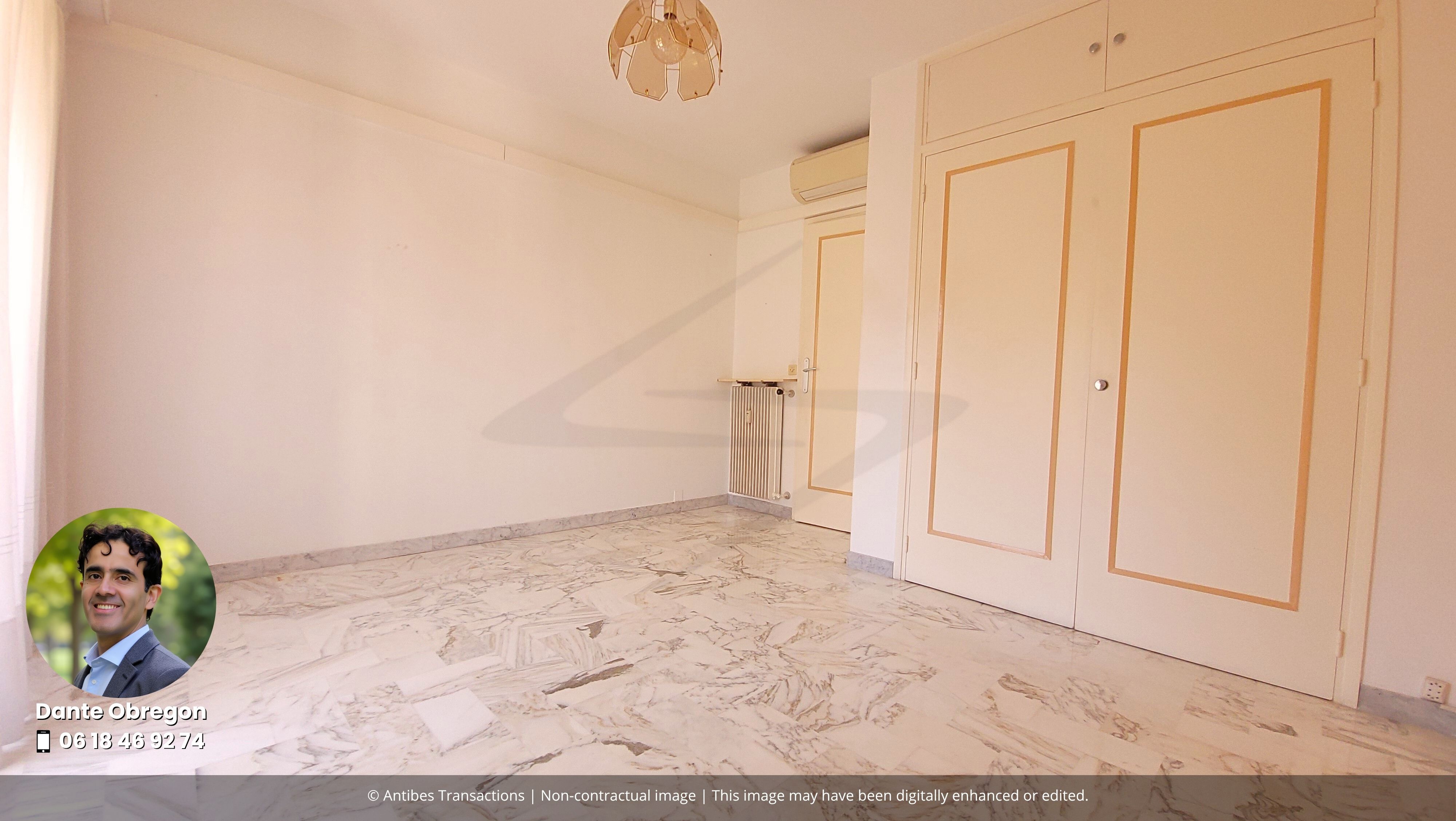 View of one of the three bedrooms