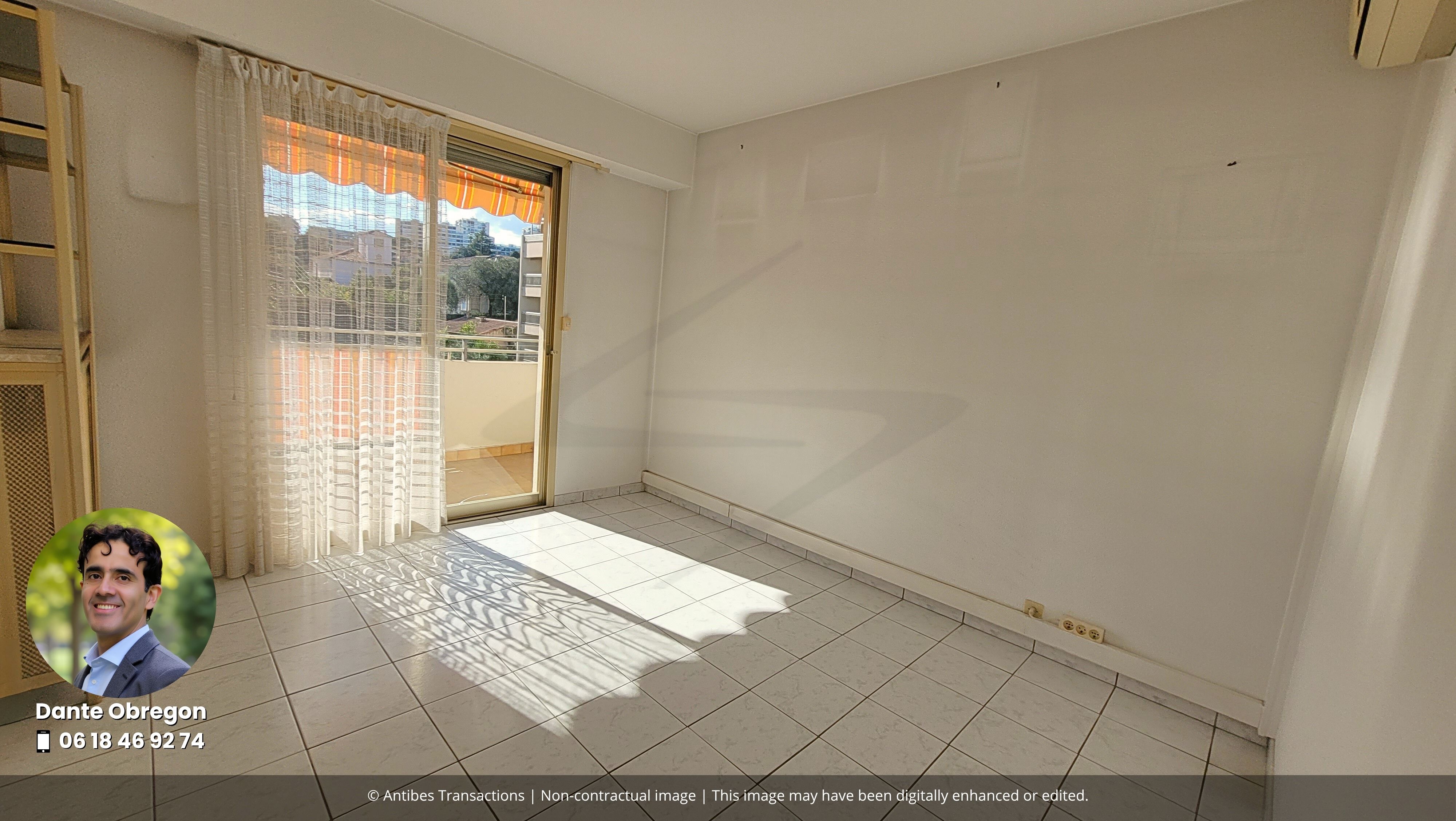 View of one of the three bedrooms