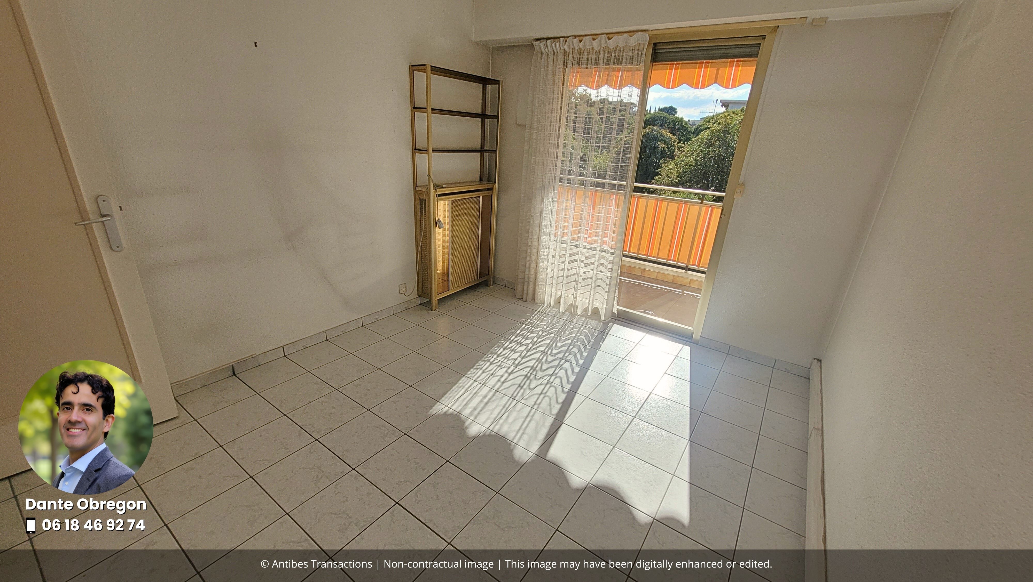 View of one of the three bedrooms