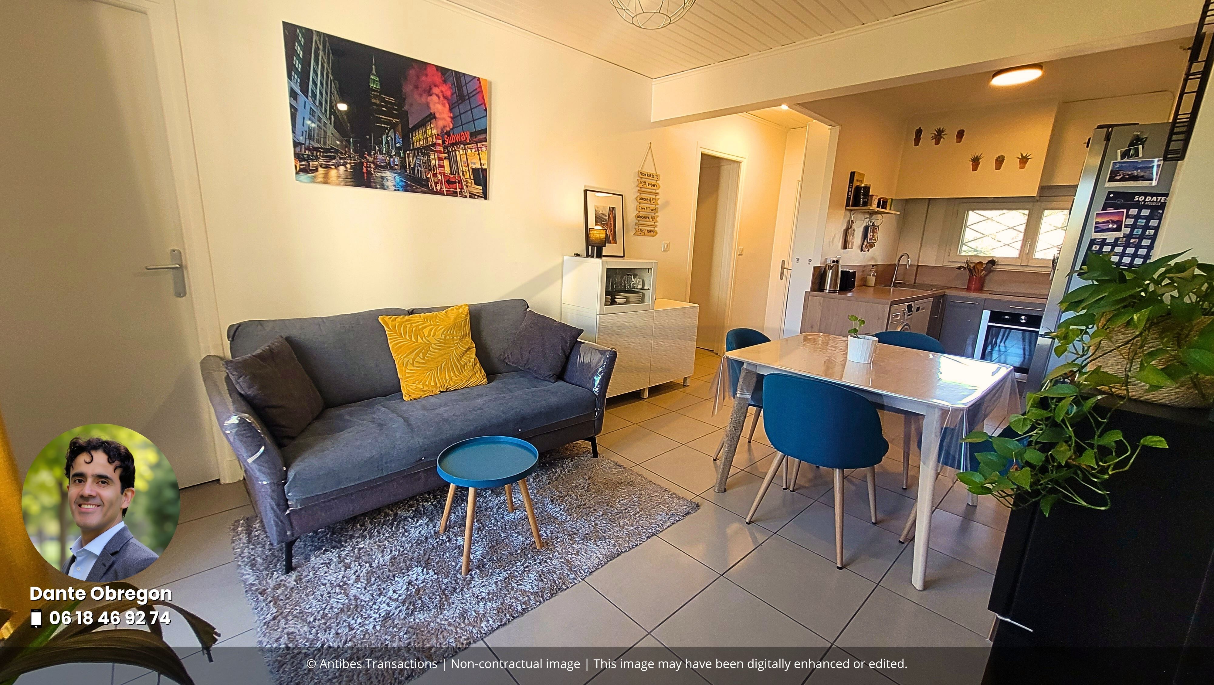 View of the lounge/dining room, open-plan kitchen and entrance