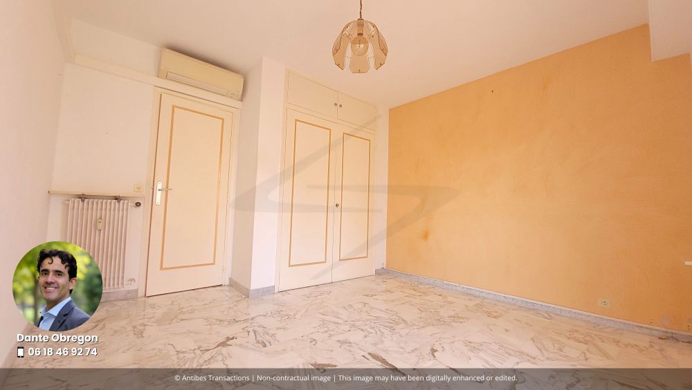 View of one of the three bedrooms