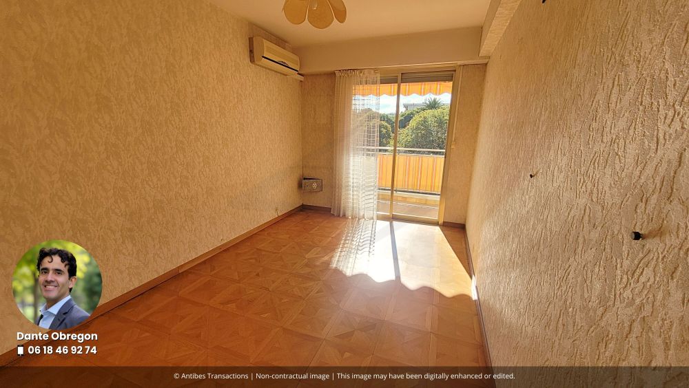 View of one of the three bedrooms