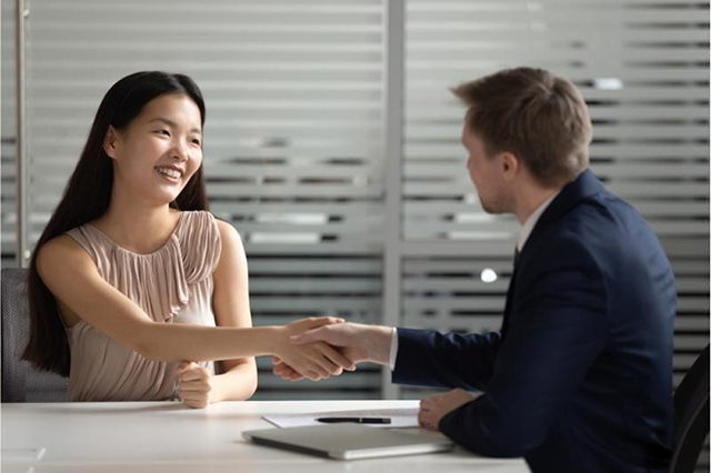 man and a woman at a job interview