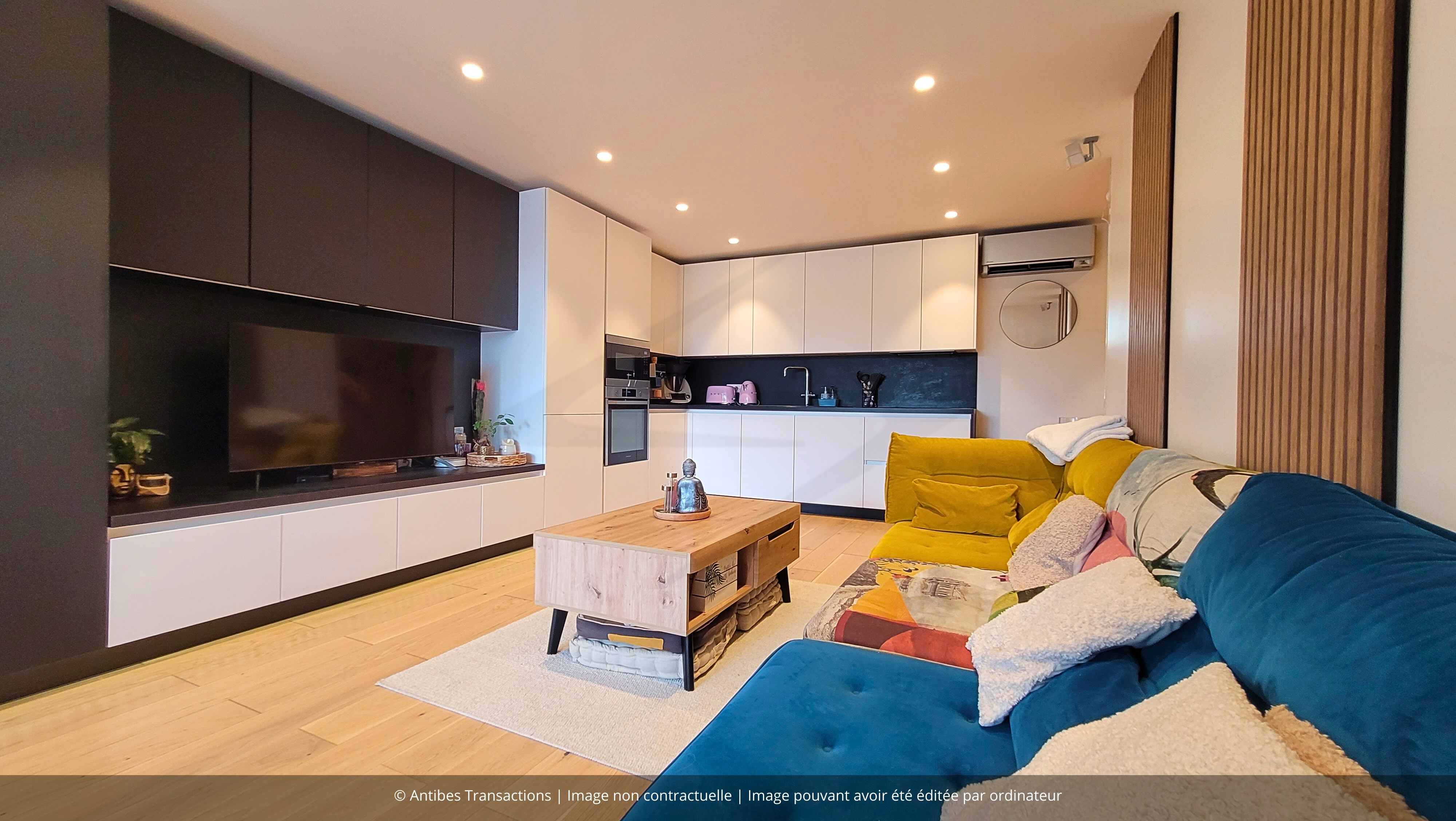 Séjour et cuisine ouverte avec mobilier sur mesure